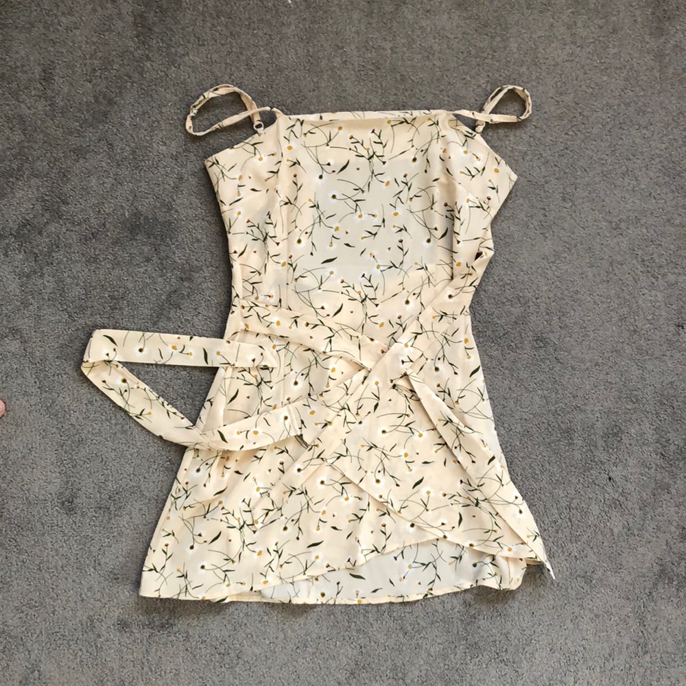 Cream wrapped dress with trendy floral pattern